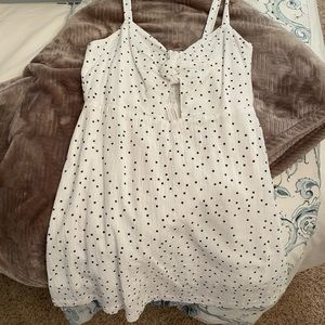 super cute little sun dress with a cut out in the front